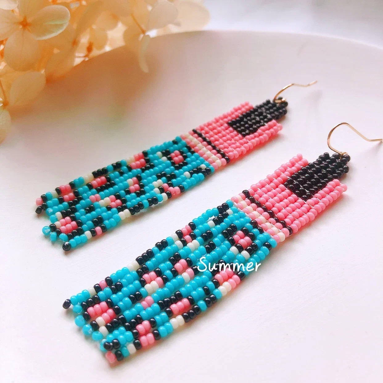 

Rice bead earrings Tassel Leopard print Irregularity Design Hand knitting Bohemia Female Alloy Simple Fashio Beaded earrings