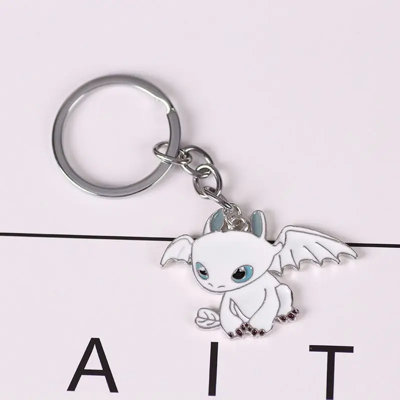 New How to Train Your Dragon Toothless Light Fury keychain with high-value cool figurine design creative couple backpack pendant view 4
