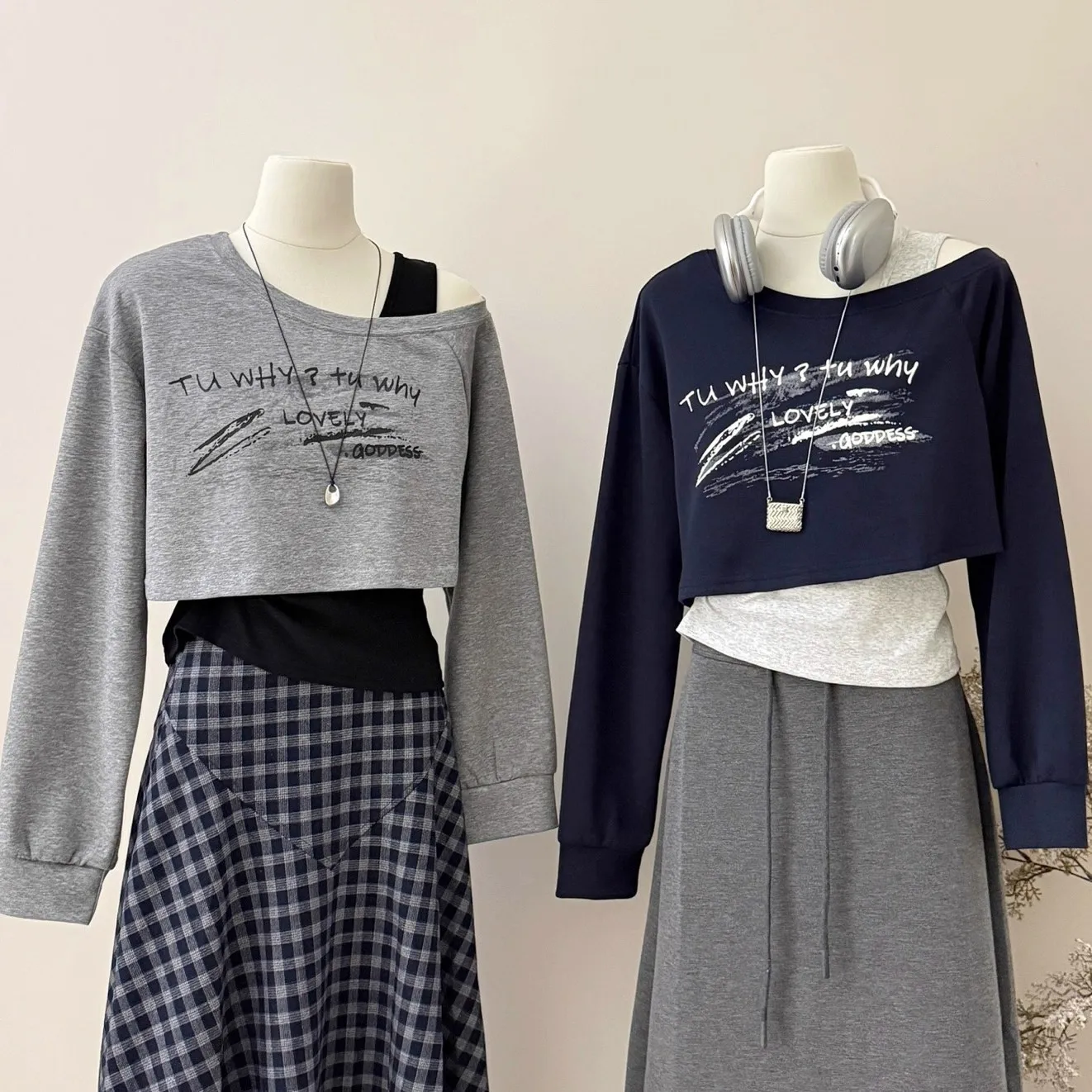 

Американский ретро-комплект из двух предметов: укороченный свитшот с асимметричным вырезом на плече и топ-майка с завязками на талии, сексуальный и шикарный, омолаживающий образ