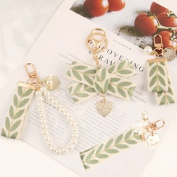 Elegant Green Leaf Pattern Ribbon Keychain Imitation Pearl Wristband Bowknot Key Ring Car Key Holder Phone Bag Decoration