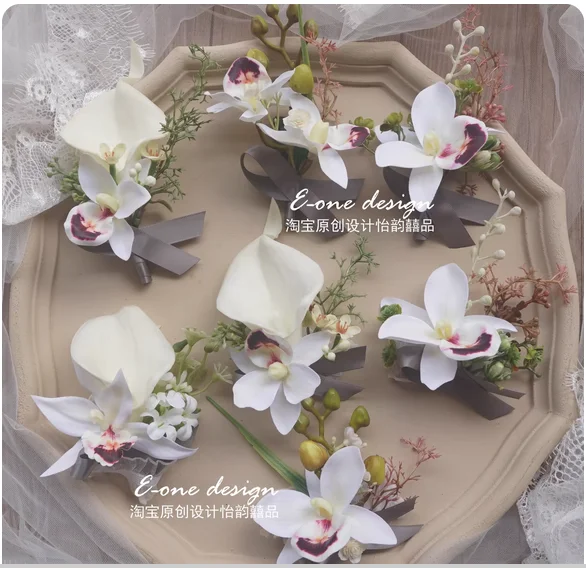 Forest lawn outdoor white and green wedding wedding bride groom bridesmaid groomsman brothers and sisters wrist flower.