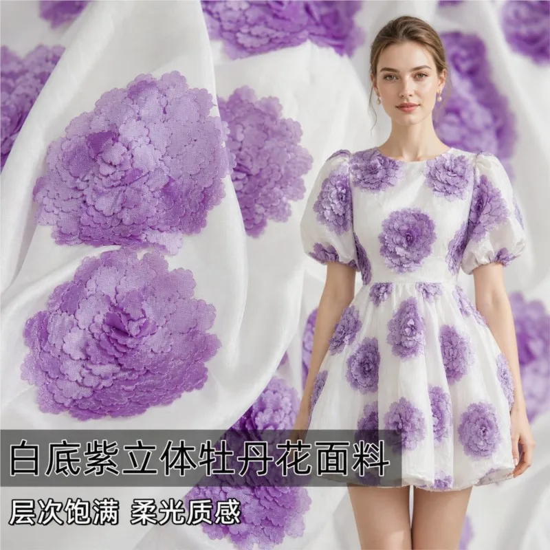 A dress made of purple three-dimensional floral cut fabric with slightly lustrous white base designed by designer