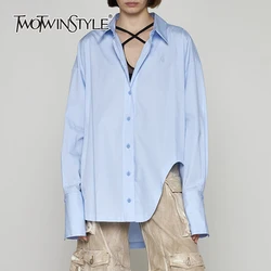 TWOTWINSTYLE Solid Minimalist Casual Loose Shirt For Women Lapel Long Sleeve Patchwork Single Breasted Irregular Shirts Female