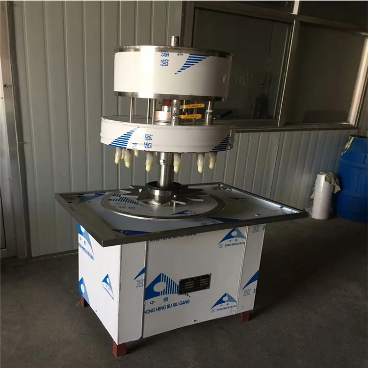 Semi Automatic 12 Heads Soda Sparkling Water CO2 Carbonated Drink Beverage Bottle Liquid Filling Machine