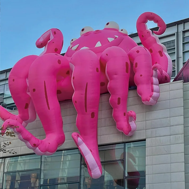 

Inflatable pink octopus, animal-based air models, can be hung on the rooftops of outdoor squares and shopping malls as decorativ