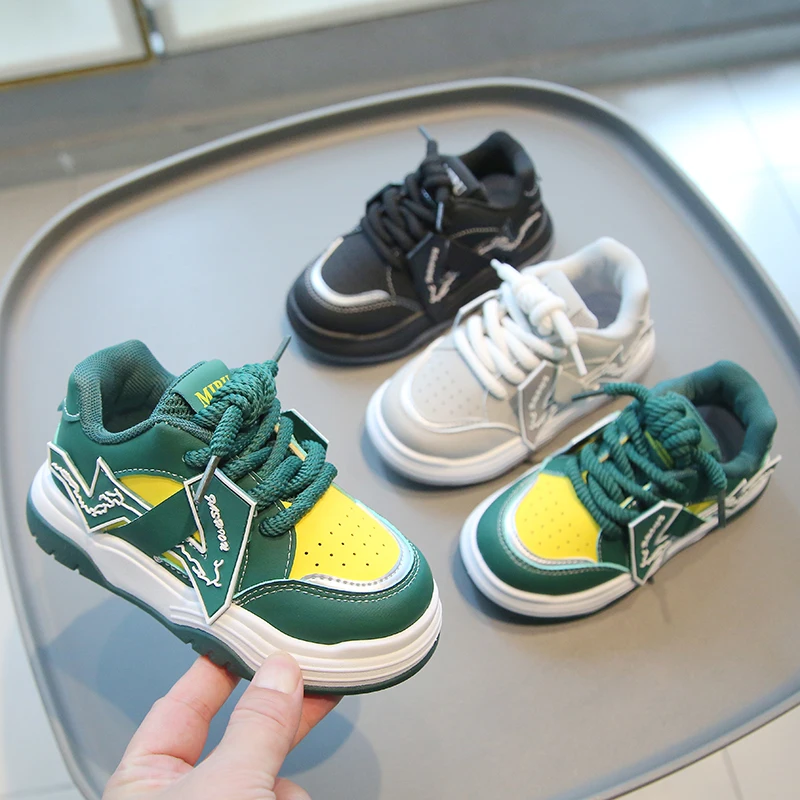 

2026 new children's shoes, boys' lightning sports shoes, girls' fashionable soft soled color blocked casual bread shoes