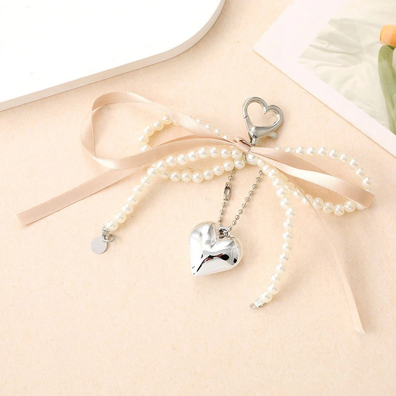 الإبداعية اللؤلؤ الشريط القلب المفاتيح الهاتف المحمول اللاسلكية سماعة حالة قلادة إكسسوارات جذابة النساء شنطة هدايا سلسلة معلقة