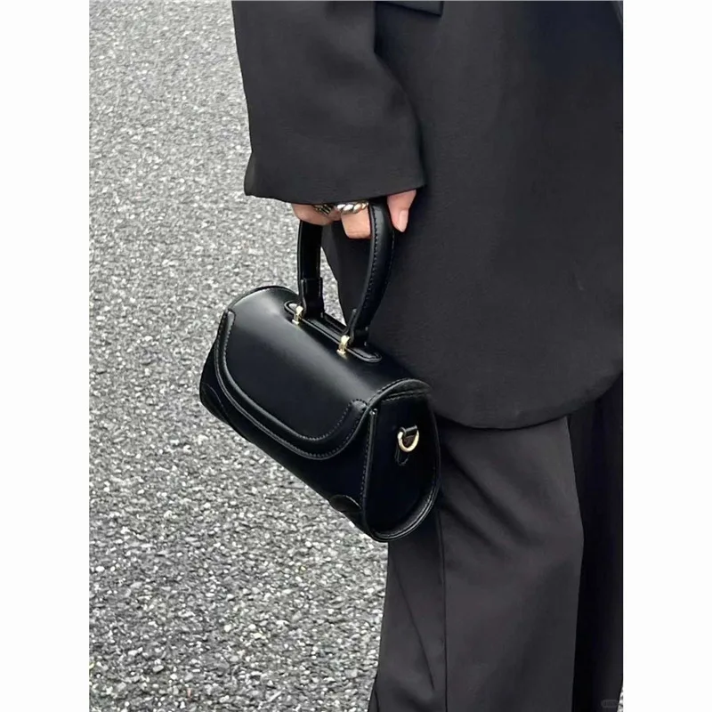 Trendy Black Synthetic Leather Handbag, Ideal for Girls and Women Globally - Top Handle & Single - Shoulder Crossbody