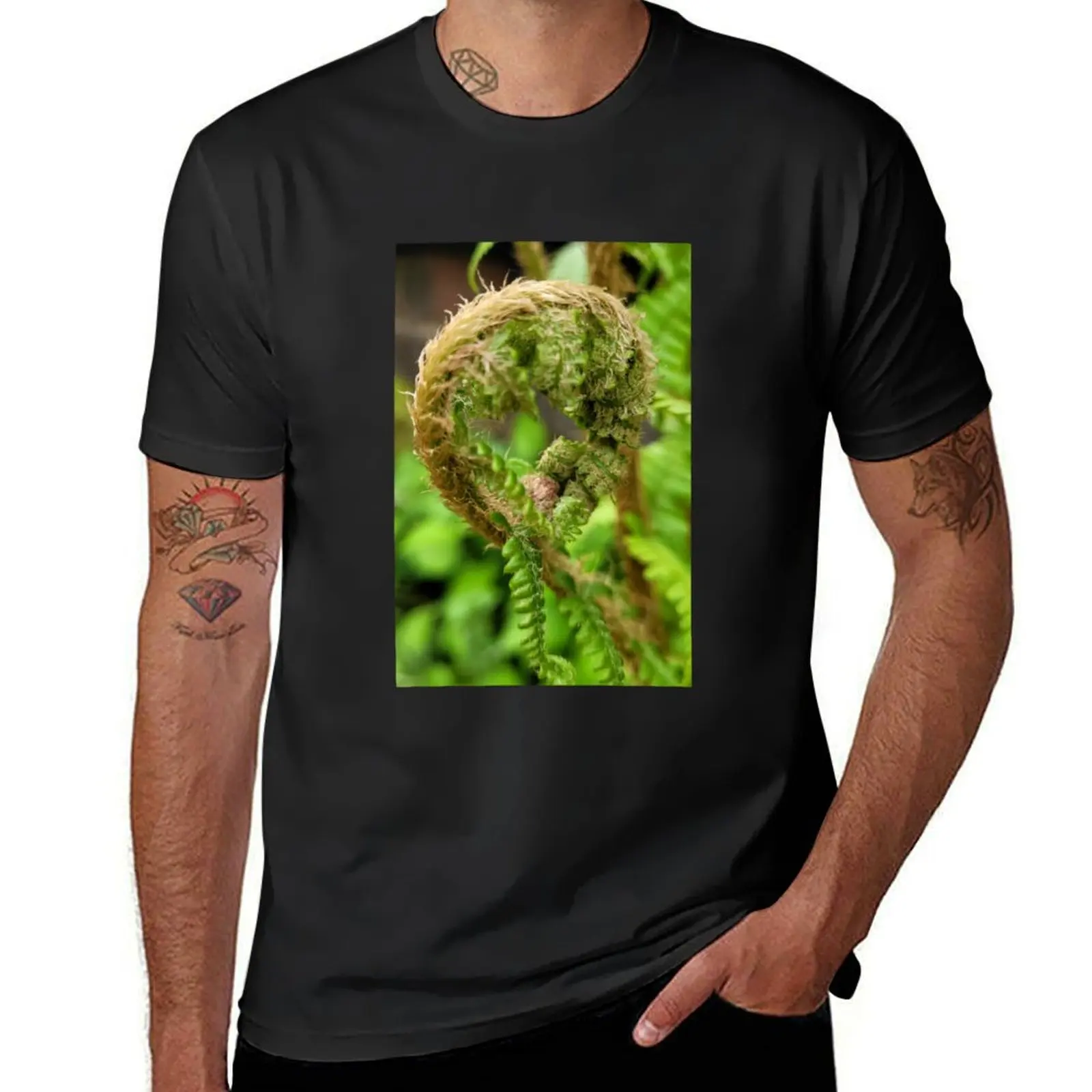 Fern uncurling on a Spring morning, sussex, england T-Shirt graphics tees tops T-shirt men