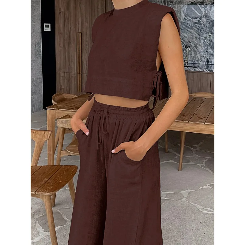 موضة القطن والكتان دعوى الملابس النسائية 2026 الربيع والصيف منصات الكتف الجديدة بلا أكمام بنطلون علوي قطعتين مجموعة