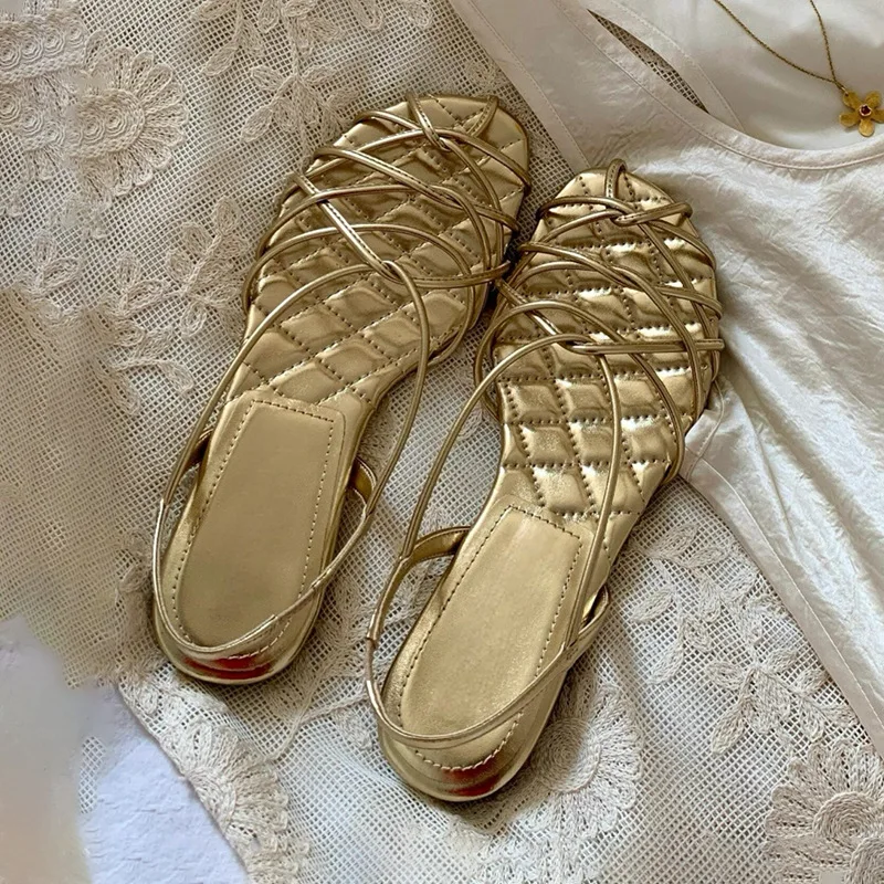 

2026 Summer French Retro Thin Strap Woven Hollow Out Open Toe Sandals Women Flat Roman Style Versatile Casual Soft Sole Footwear