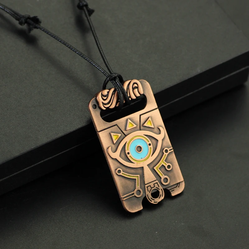 La leyenda del collar Escudo hylian Ojo de Sheikah Máscara de Majora Espada Triforce Símbolo Colgante Zelda Lágrimas del Reino