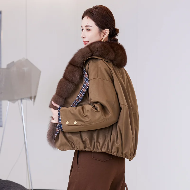 سترة نسائية كبيرة الحجم شتوية فضفاضة تناسب سترة قصيرة مع ياقة من الفرو موضة جديدة للتنقل الأنيق