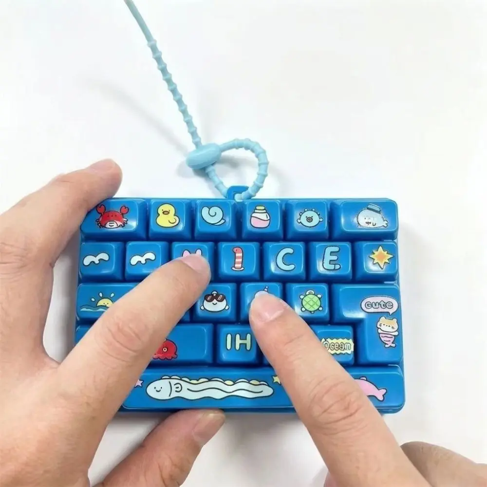 Sensorischer, mehrfarbiger 26-Tasten-Schlüsselanhänger, 26-Tasten-Gitter, Cartoon-Fidget-Mini-Tastatur, mechanischer Schlüsselanhänger, Handentspannung – Detail 4