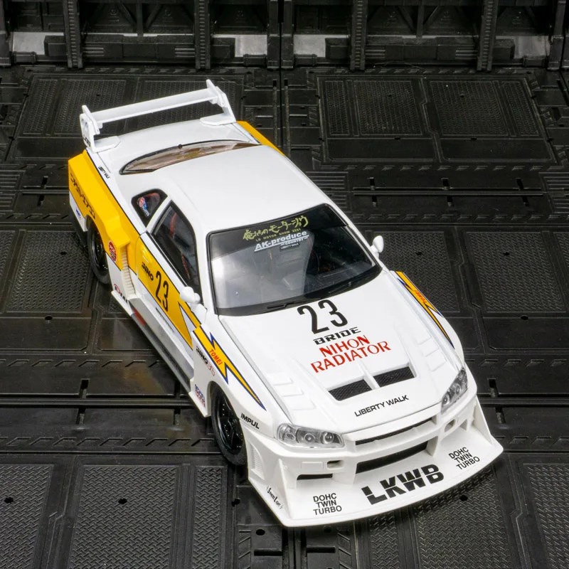 1:24 Nissan GT-R34 Skyline puertas de modelo de coche de aleación y tapa de motor, el maletero se puede abrir tiene funciones de sonido y iluminación simuladas