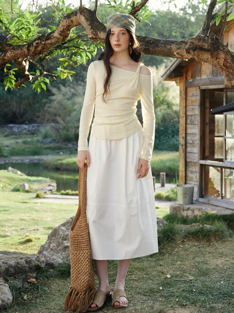 Olrain feminino listrado topos 2026 primavera estilo francês oco para fora senhoras camisetas casual fino ajuste dobras camisetas femininas o58ct003055