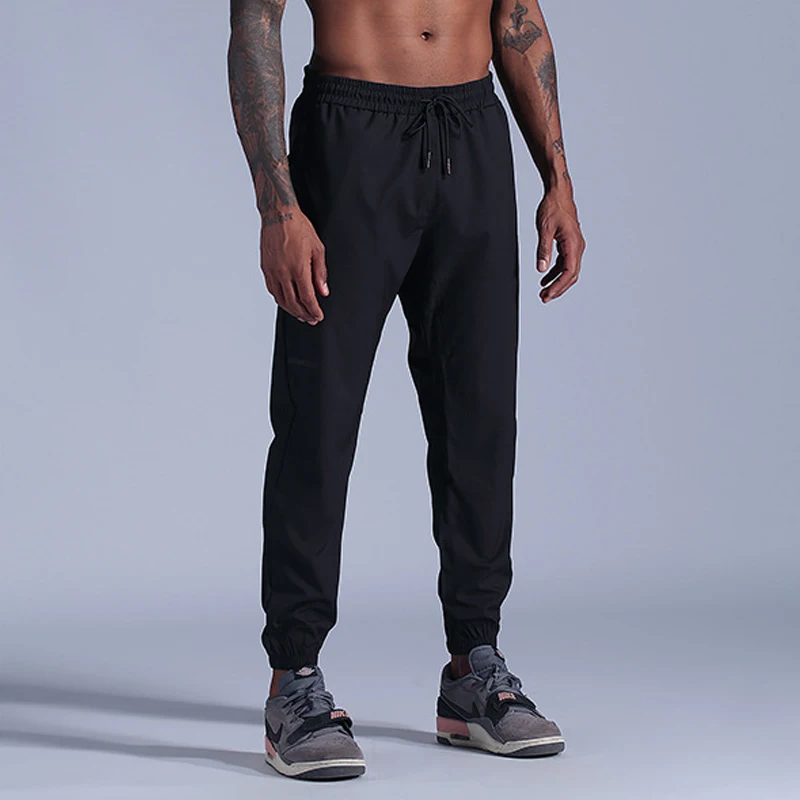 2023 New Men\'s Sweatpants Man Thin Fitness Gym Trousers Slim Fit Quick Dry Running Long Pants Elastic Men Workout Pant 3XL