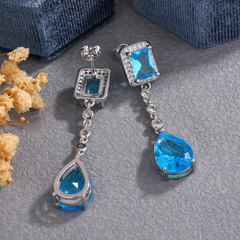 

Элегантные женские светло-голубые серьги с цирконием, серьги серебряного цвета 925, милые висячие длинные свадебные украшения в стиле бохо для женщин
