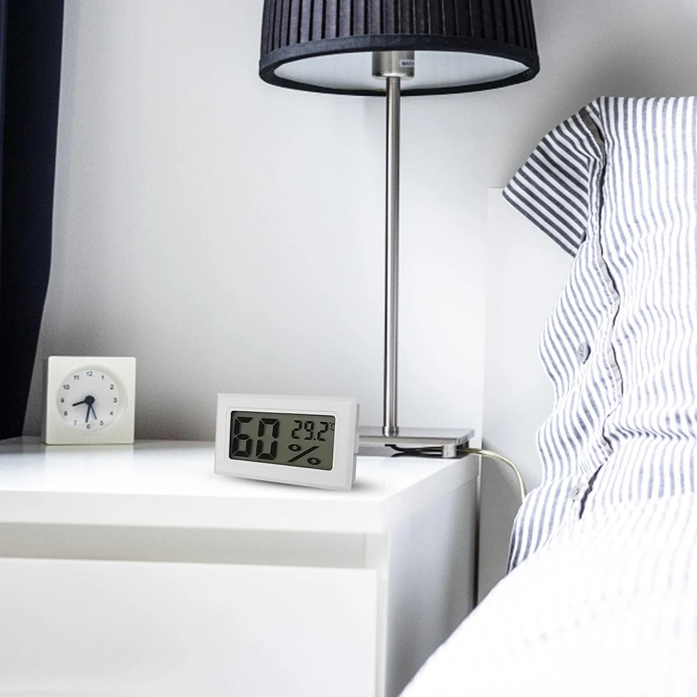Portable digital temperature and humidity sensor with accurate readings and large LCD display designed for indoor monitoring