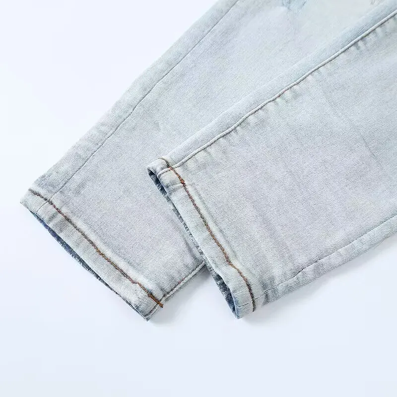 High Street Jeans pria Fashion celana Denim Hip Hop pria Jeans ketat melar biru muda Retro celana Jeans robek untuk pria