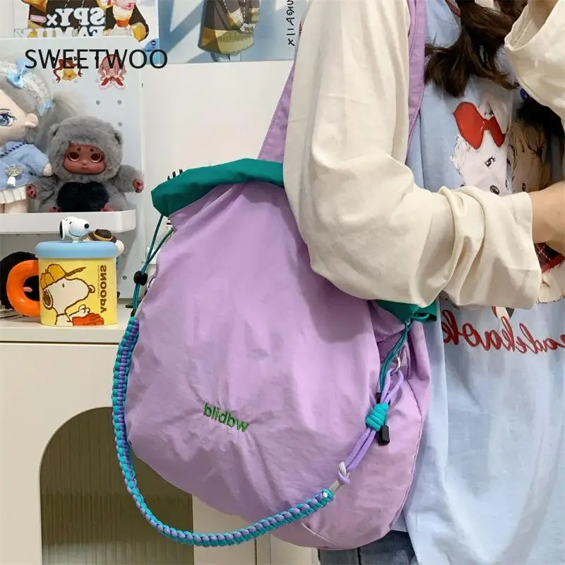 2026 Dopamine Color Block Drawstring Crossbody Bag Lightweight Waterproof Nylon Purse for Daily Travel
