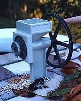 

Hand crank grain mill with adjustable setting for flour fineness