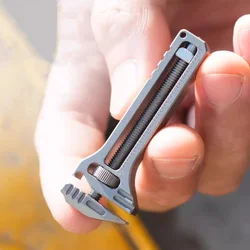 12 in 1 Multifunctional Titanium Alloy Mini Adjustable Wrench, Bottle Opening EDC Self-defense Tool Ruler Phone Holder Keychain