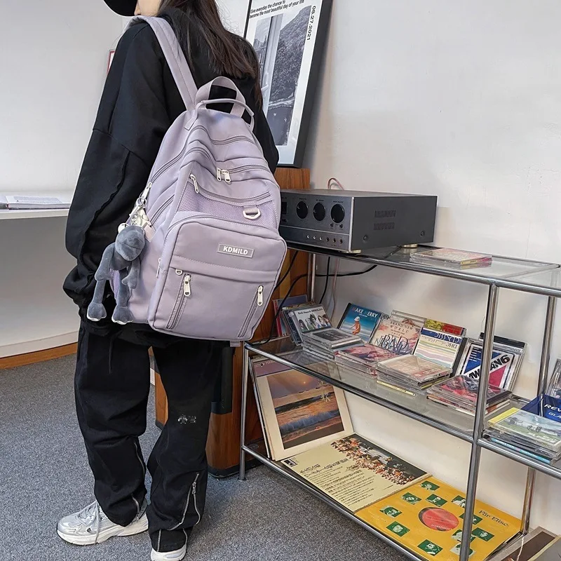 1pcs Cream White  Nylon Large Capacity Multi Layer Backpack Side Mesh Pocket With Doll Pendant Student School Bag
