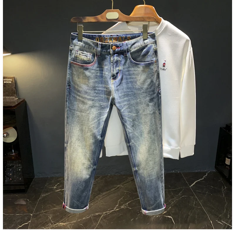 Tren jeans pria baru musim gugur 2025, celana kasual serbaguna berkualitas tinggi, dicuci, elastis, dan nyaman.