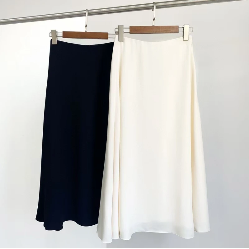 تنورة متوسطة الطول كلاسيكية على الطراز الأوروبي والأمريكي بعمر 25 عامًا بلون سادة معلقة بخصر عالٍ