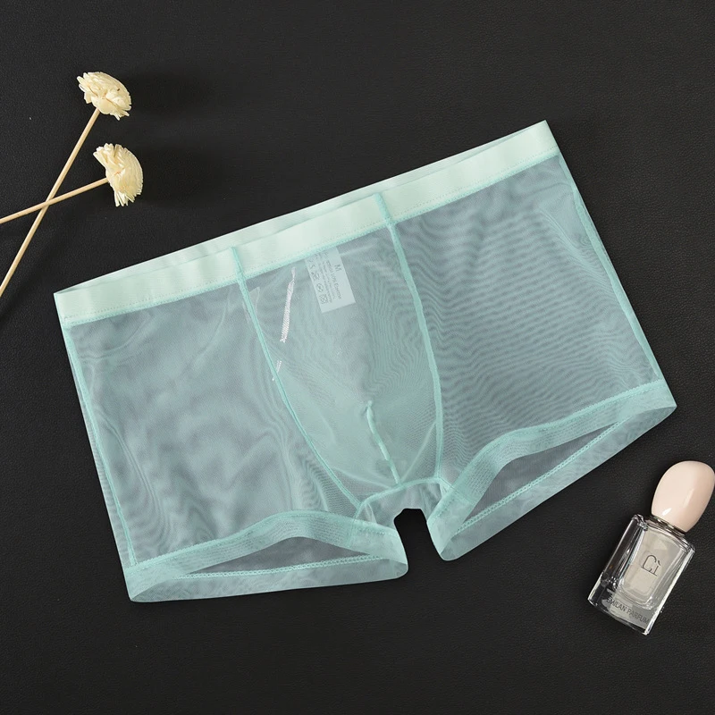 Calzoncillos Bóxer transparentes ultrafinos para hombre, ropa interior Sexy sin costuras, de malla, de tiro medio