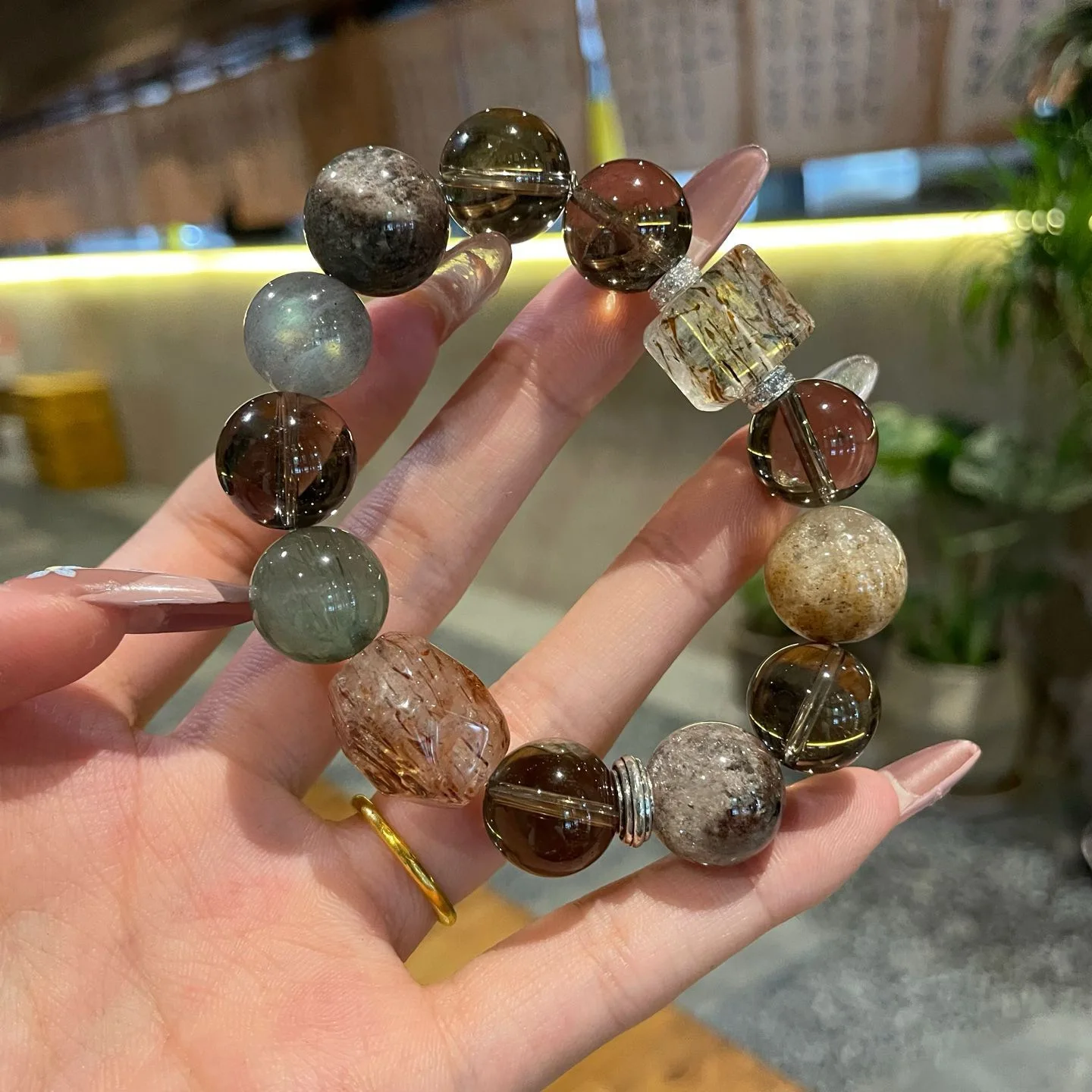 

Natural Crystal Bracelet Female Black Gold Super Seven Bracelet Four Seasons Ghost Tea Crystal Lucky Grey Moonlight Hand String