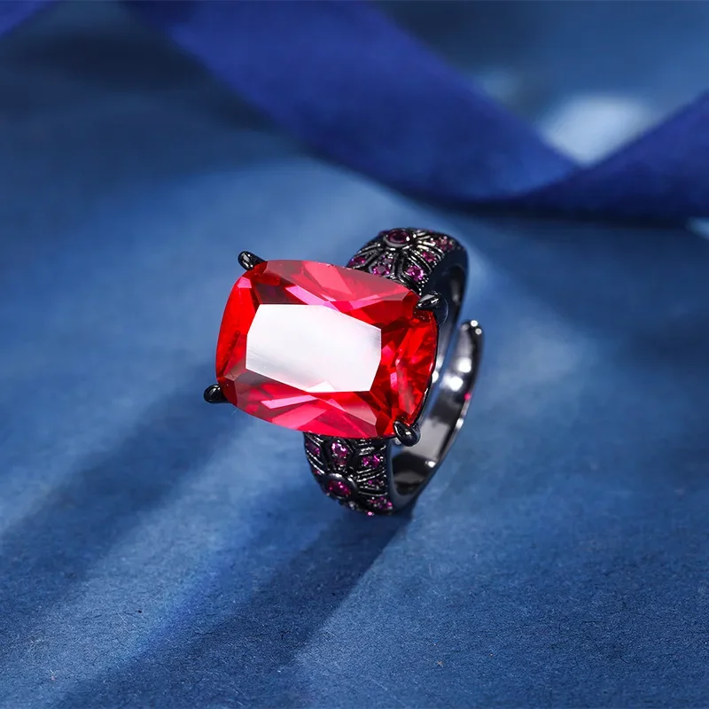 New high-end jewelry copper base plated with black gold retro red corundum blue spindle personality ring female main stone 12*16