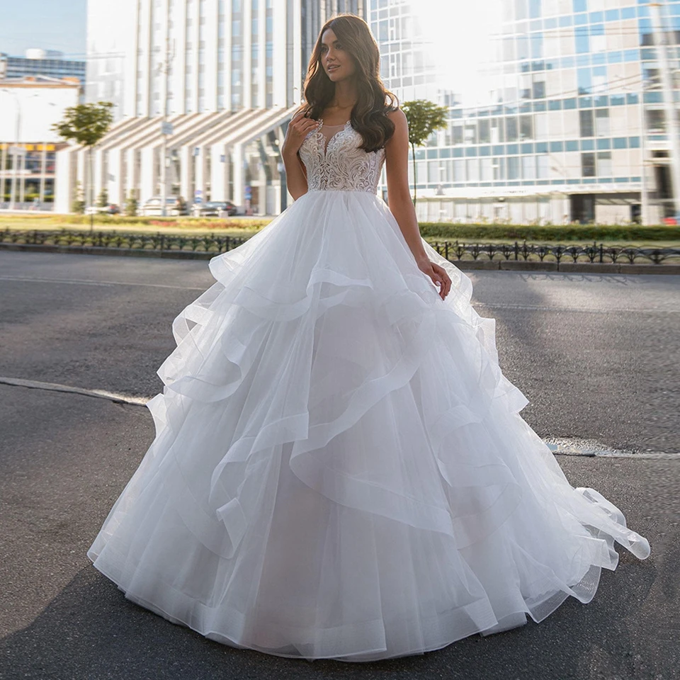 Vestidos de novia sin mangas con apliques de encaje encantadores personalizados, vestidos de novia sexis de tul con botones y cuello redondo para mujer 2025