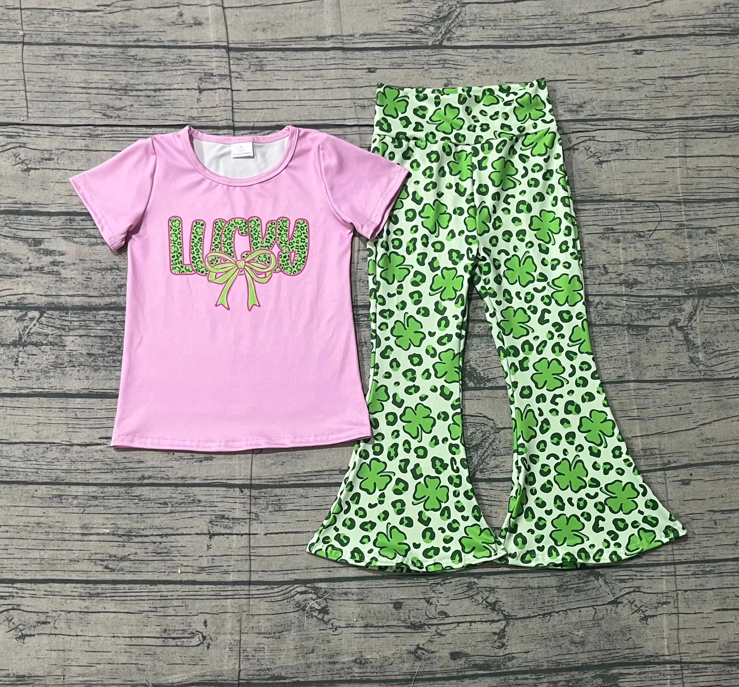 Conjunto de Ropa para Niños Pequeños al por Mayor, Camiseta de Manga Corta, Pantalones de Campana con Estampado de Leopardo, Conjunto Verde para Niñas, Ropa para el Día de San Patricio