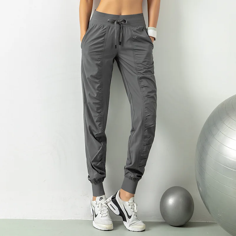 Pantaloni sportivi larghi per le donne pantaloni dimagranti ad asciugatura rapida leggings fitness da corsa casual pantaloni da yoga traspiranti set