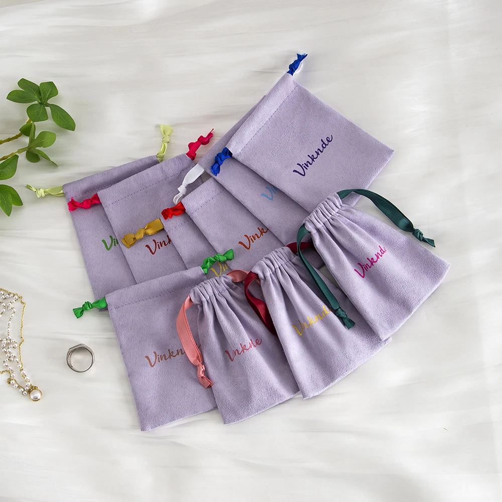 

100pcs Purple Earrings Rings Velvet Drawstring Jewelry Bag Flannel Suede Packaging Ribbon Pouches Chic Wedding Favors Gift Sack