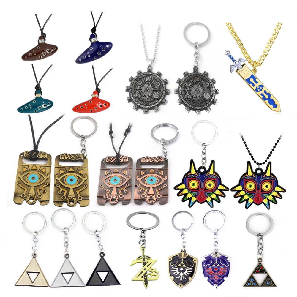 LLavero de escudo Hylian de Zeldas para hombre, colgante con símbolo de Breath of The Wild Sheikah Eye, máscara de Majora, espada y Triforce, joyería