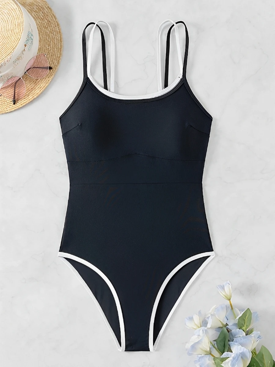 2025 Traje de baño sexy de tiras Traje de baño negro de una pieza Bañistas sólidos femeninos Traje de baño Traje de baño Ropa de playa