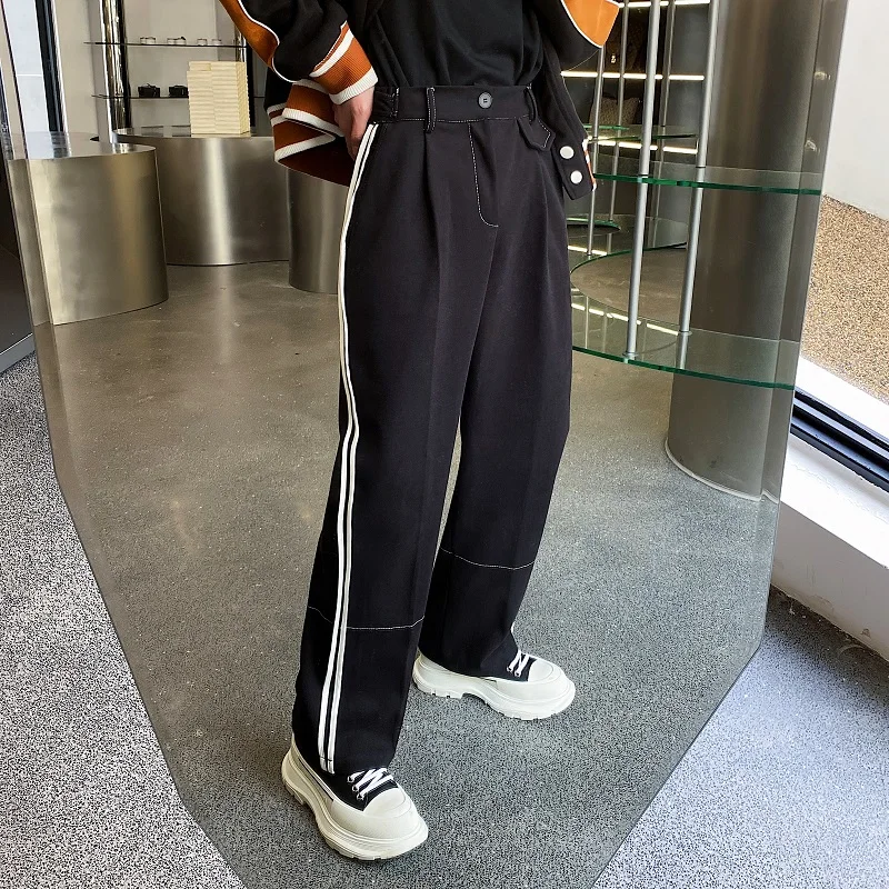 

Весенние оригинальные модные мужские повседневные брюки премиум-класса с контрастными цветовыми блоками и S-образным дизайном, удлиняющие ноги, прямые джинсы