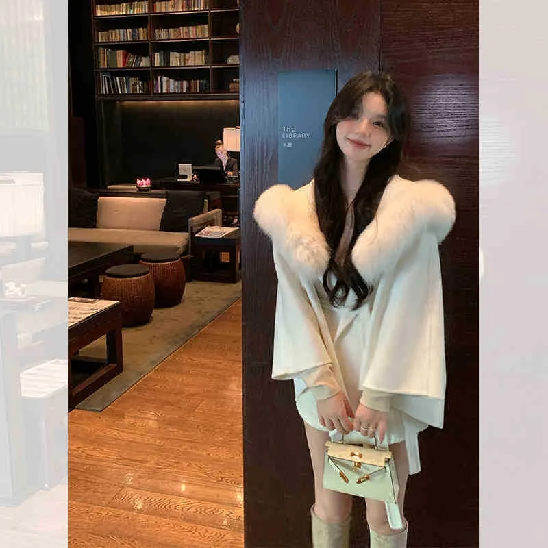 ขายร้อนแฟชั่นผู้หญิงขนสัตว์เสื้อขนสัตว์ความยาวปานกลาง high-end ขนสุนัขจิ้งจอกธรรมชาติสองด้าน cashmere coat ใหม่ฤดูใบไม้ร่วงฤดูหนาวเสื้อคลุม