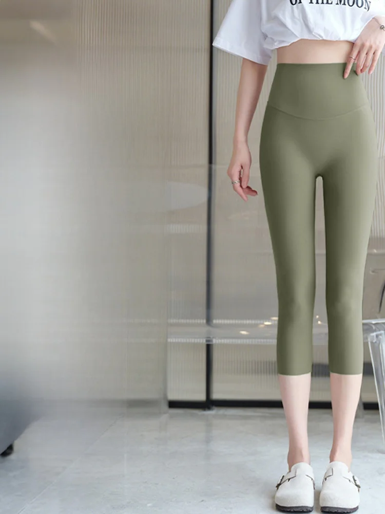 جديد 2025 سروال يوجا نسائي من جلد arkskin مصنوع من الحرير الجليدي سروال صيفي رقيق عالي الخصر بسبعة أقدام للياقة البدنية والبطن...