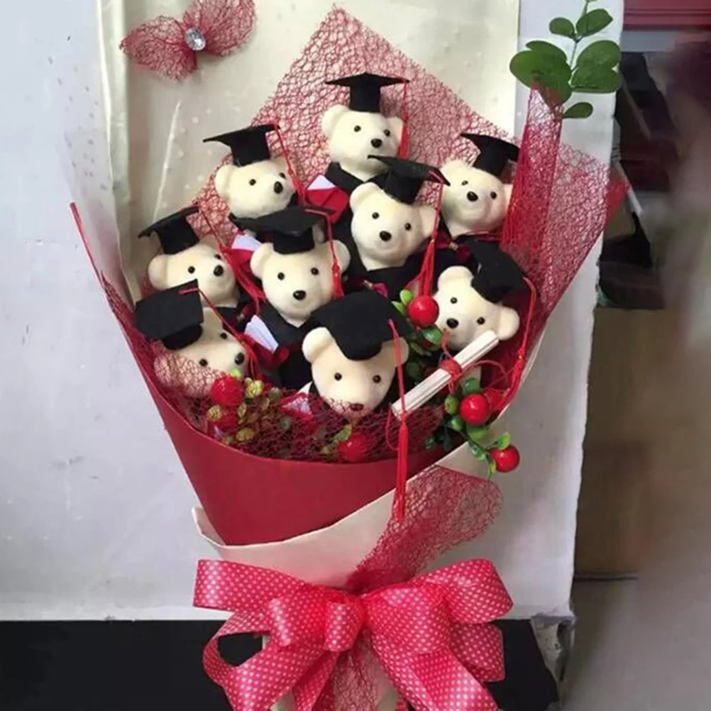 8 Uds temporada de graduación Dr Bear dibujos animados DIY muñecas juguete flor de peluche suministros decorativos fiesta para ramo regalo