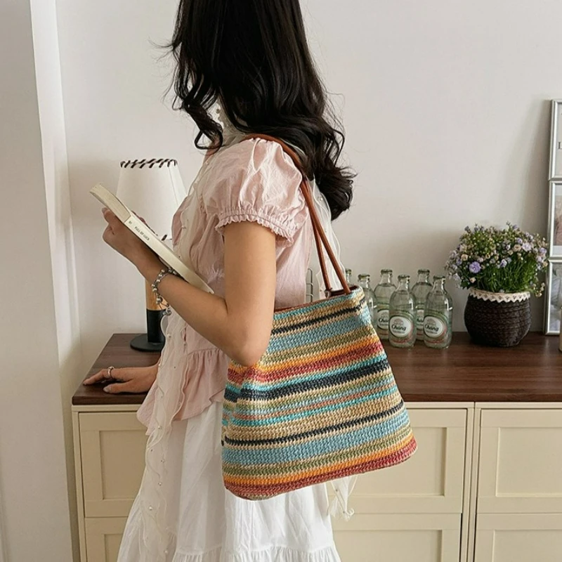 

New Striped and Multi-color Handbag Made of Woven Grass, A Simple and Spacious Shoulder Bag in The Shape of A Watering Can.