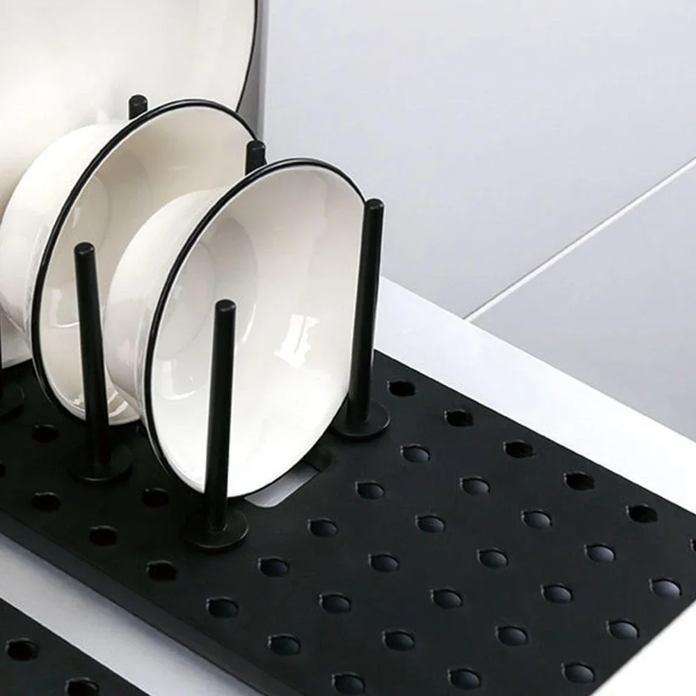 Telescopic rack showing adjustable length mechanism and separated dish compartments
