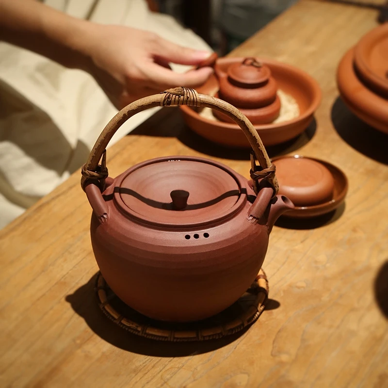 Vine handle lifting beam pottery clay health preservation boiling tea pot boiling water pot Chinese handmade purple clay pot