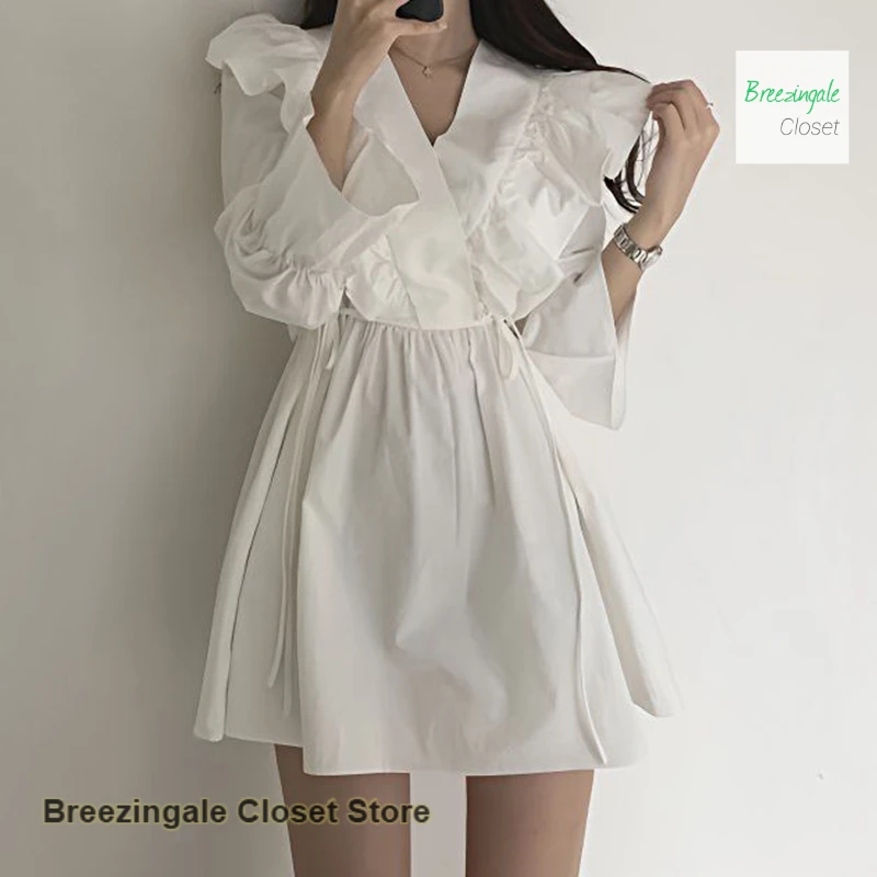 

French V-neck cross ruffled Hepburn wind horn long sleeve waist dress women's spring and autumn new retro casual Joker skirt