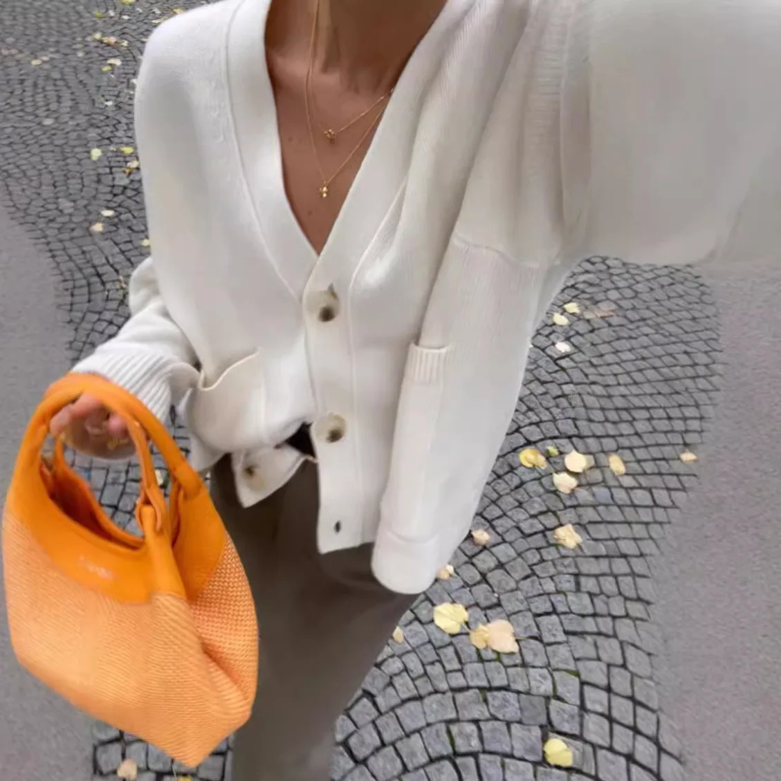 2025 Otoño e Invierno prendas de vestir exteriores para mujer cárdigan de punto de Color sólido cárdigan suelto de moda de manga larga con cuello en V