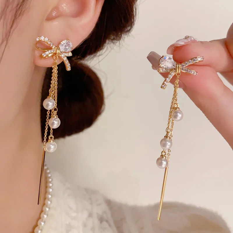 Korean Style Micro Inlaid Zircon Bow Pearl Long Tassel Personalized Fashion Light Luxury High-end Earrings for Women Jewelry.