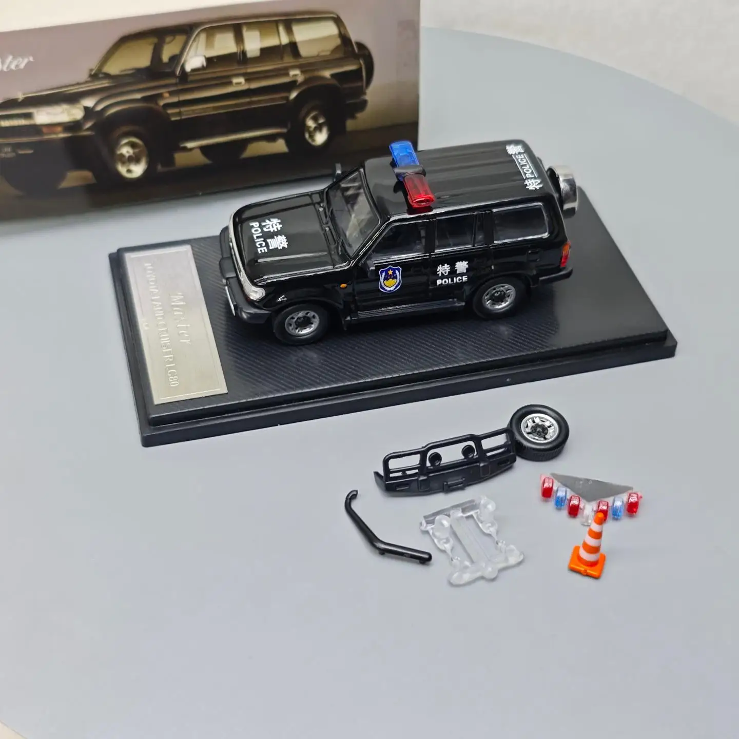 1:64 Land Cruiser LC80 Spezialpolizeiversion Simulation Legierung Mini Automodell Sammlung Geschenk Spielzeug